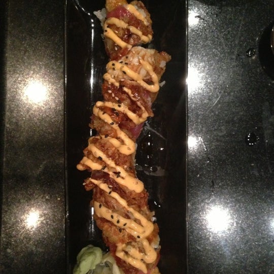 Photo taken at Mikaku Restaurant by Carlos G. on 12/6/2012