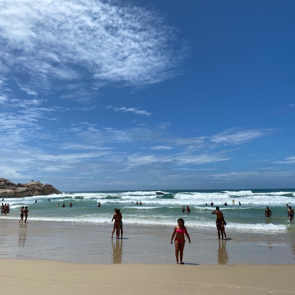 Photo taken at Praia da Joaquina by Richard H. on 2/7/2020