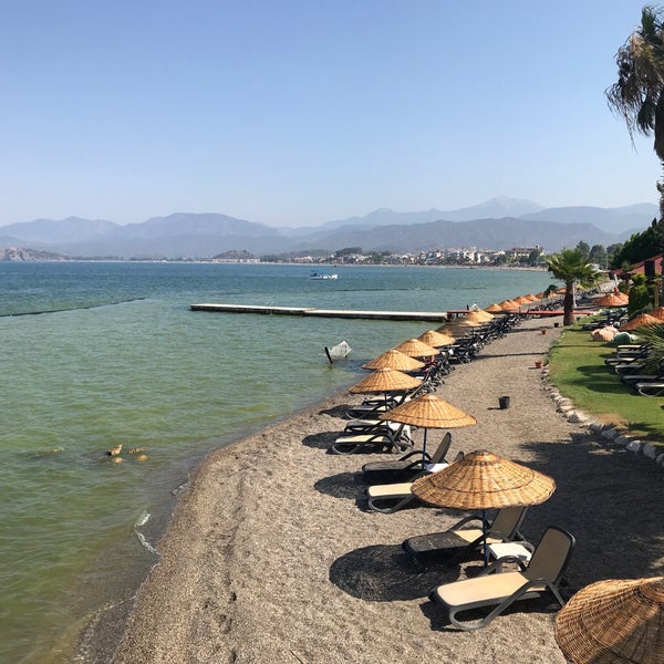 Photo taken at Şat Beach Club by ozgek on 7/10/2019