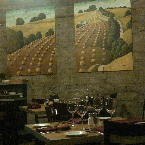 Photo taken at Zin Restaurant &amp; Wine Bar by Kelly B. on 1/24/2013