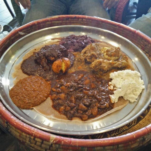 Foto diambil di Ras Dashen Ethiopian Restaurant oleh Varshith A. pada 3/15/2015