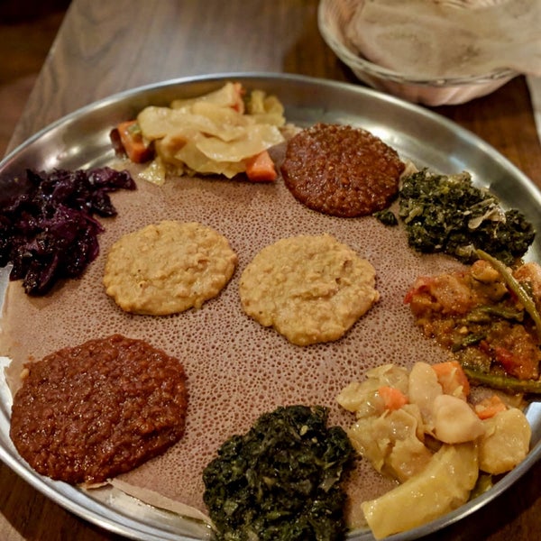 Photo taken at Ras Dashen Ethiopian Restaurant by Sophie H. on 1/12/2019