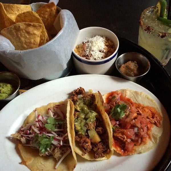 Photo taken at Taco Santo by Mike C. on 6/28/2015