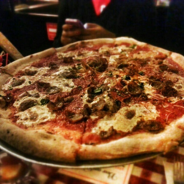 Photo taken at Lombardi&#39;s Coal Oven Pizza by Daqwan K. on 2/9/2013