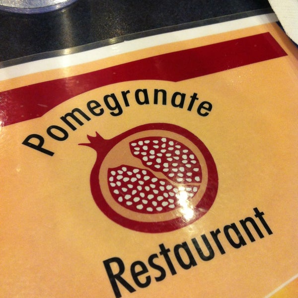 Photo taken at Pomegranate Cafe by Jeff D. on 12/28/2012