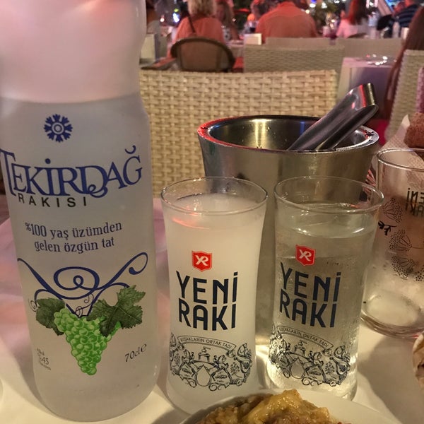 Photo taken at Neighbours Restaurant by Turhan G. on 8/28/2018