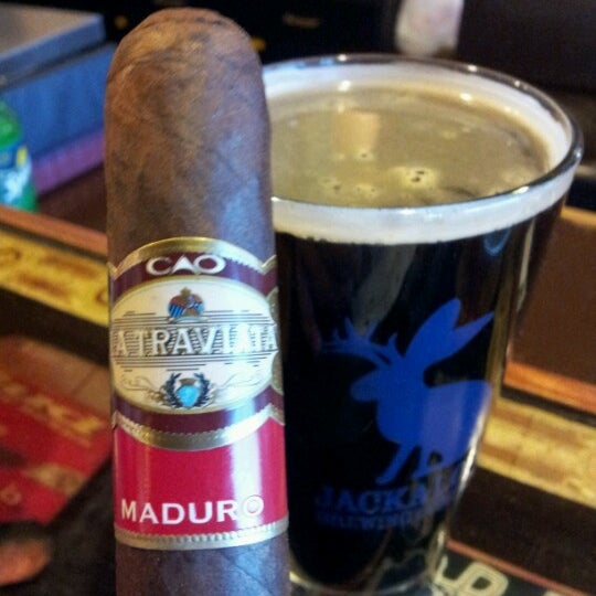 Photo taken at Crown Cigars and Ales by Sam M. on 1/26/2013