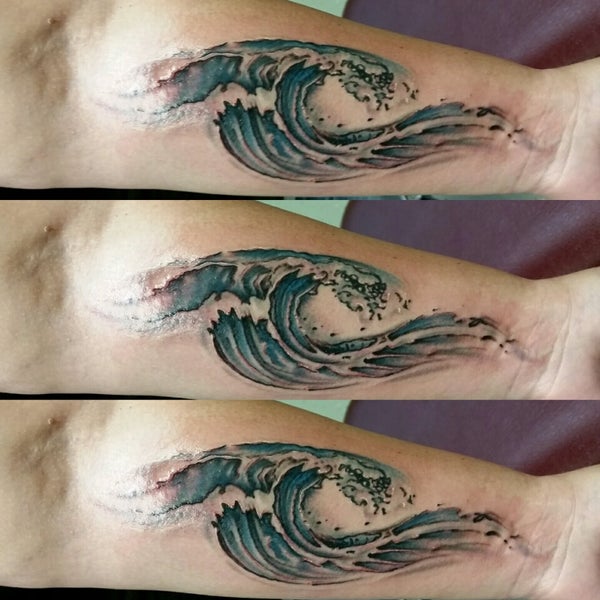Wave tattoo by Jeffrey Ziozios at Bay City Tattoos in Tampa Florida