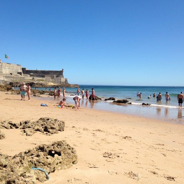 Photo taken at Praia dos Gémeos by olga m. on 8/7/2014