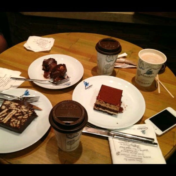 Photo taken at Caribou Coffee by Merve M. on 3/2/2015