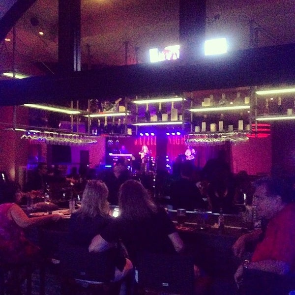 Photo taken at Jazziz Nightlife by Megan H. on 8/6/2014