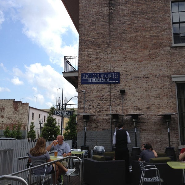 Nice outside terrace with 40s music and typical hamburger type menu