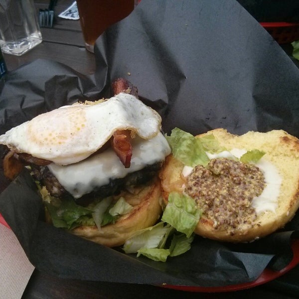 Foto diambil di Woody&#39;s Burgers bar and grill oleh James S. pada 10/5/2013