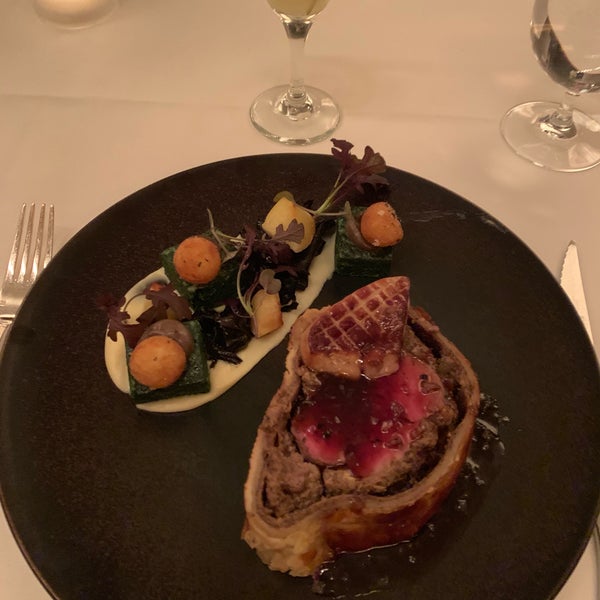 Photo taken at Café Boulud by Christian P. on 12/22/2018