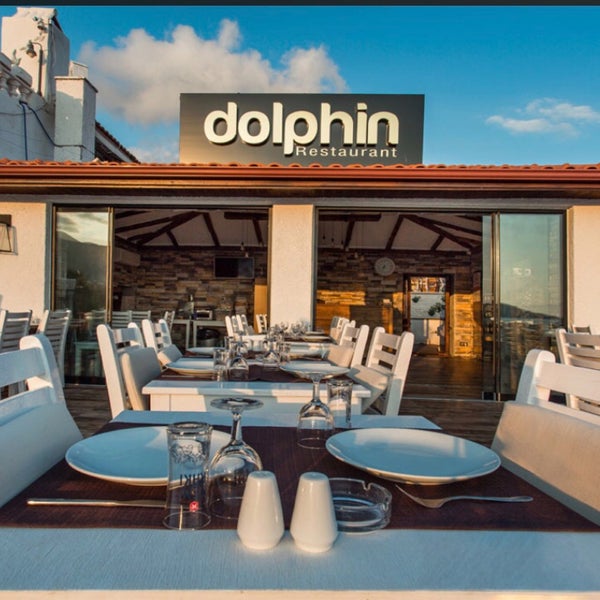 Photo taken at Dolphin Restaurant by Ali A. on 7/19/2019