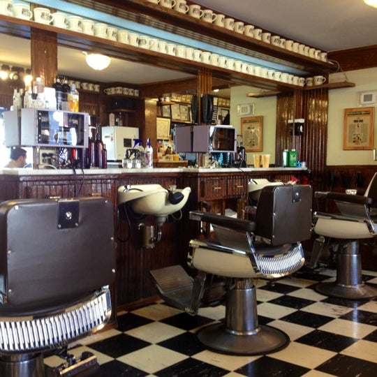 Photo taken at Paul Mole Barber Shop by Thomas G. on 3/27/2012