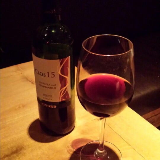 Photo taken at Plancha Tapas and Wine Bar by Mel W. on 1/28/2014