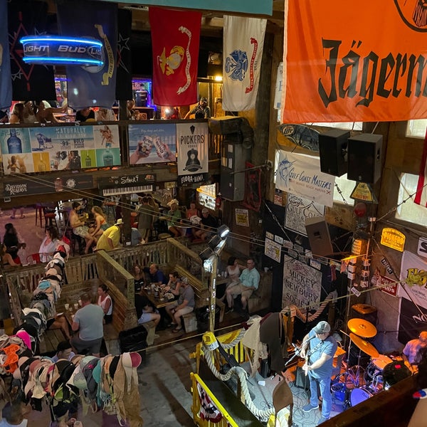 Photo taken at Flora-Bama Lounge, Package, and Oyster Bar by Jeff H. on 7/3/2021