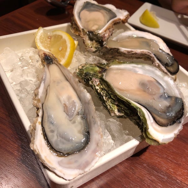 Photo taken at THE CAVE DE OYSTER TOKYO by みー む. on 8/15/2019