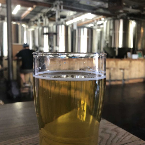 Photo taken at Societe Brewing Company by K E G. on 4/8/2022