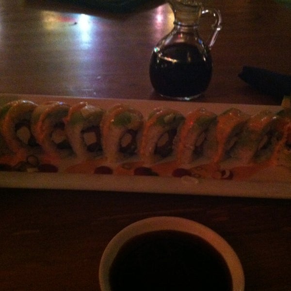 Photo taken at Happy Fish Sushi And Martini Bar by Stephanie H. on 2/12/2013