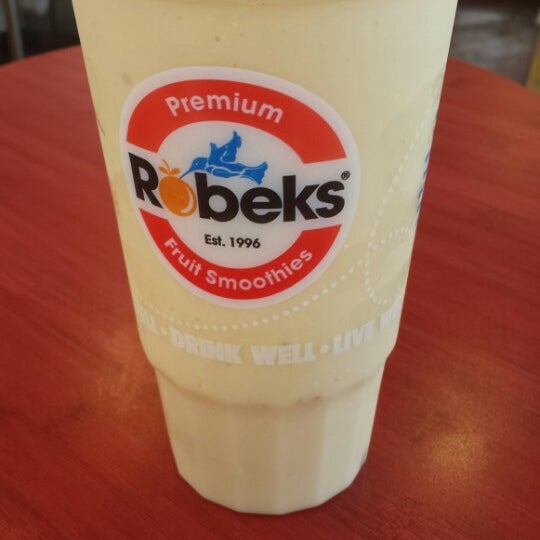 Photo taken at Robeks Fresh Juices &amp; Smoothies by Andrew D. on 9/10/2013