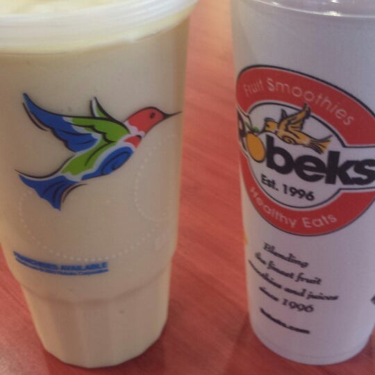 Photo taken at Robeks Fresh Juices &amp; Smoothies by Andrew D. on 9/11/2013