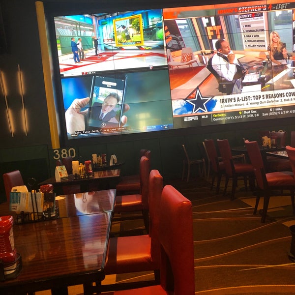 Photo taken at National Pastime Sports Bar &amp; Grill by Regina H. on 7/29/2019
