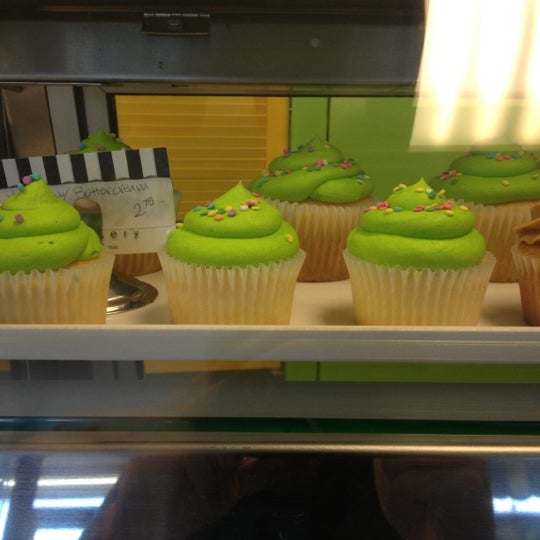 Photo taken at Sugar &amp; Spice Cupcakery by Jason T. on 10/5/2012