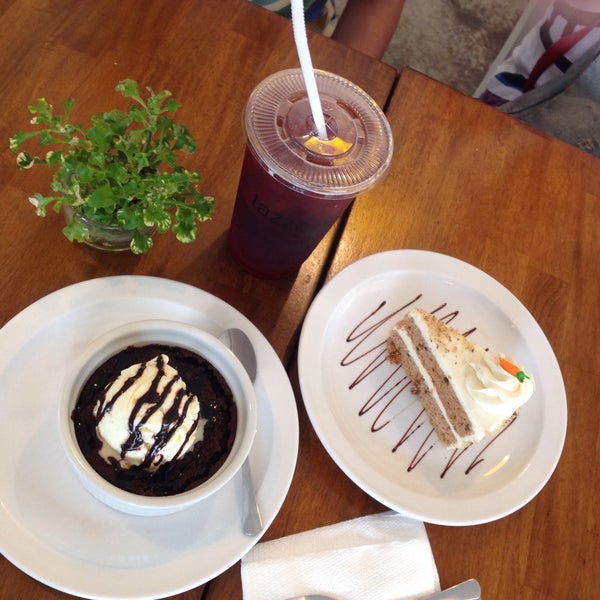 Photo taken at Tazza Cafe and Patisserie by Crystal H. on 3/8/2015