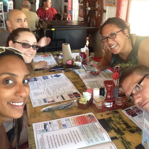 Photo taken at Tim&#39;s Rivershore Restaurant and Crabhouse by Kimberly B. on 8/15/2015