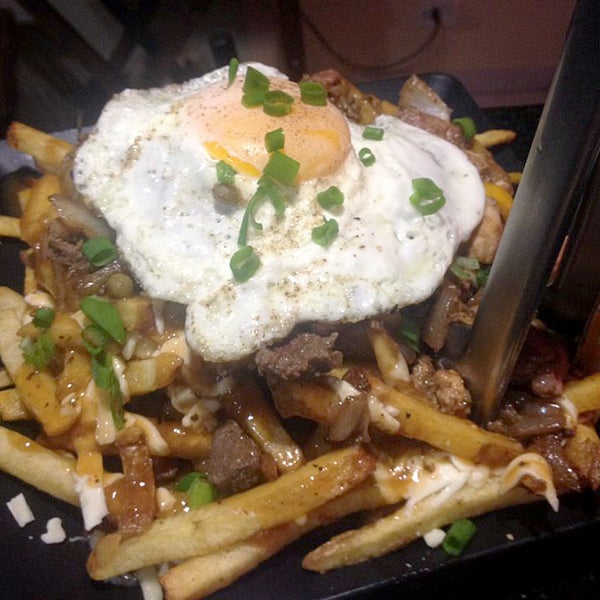 Photo taken at Canuck&#39;s Poutinerie by Canuck&#39;s Poutinerie on 3/22/2016