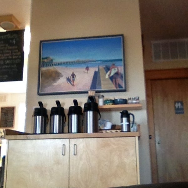 Photo taken at Waveriders Coffee &amp; Deli by Kim C. on 5/26/2013