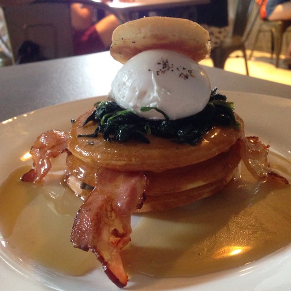 Love their pancake stack with bacon and poached egg!