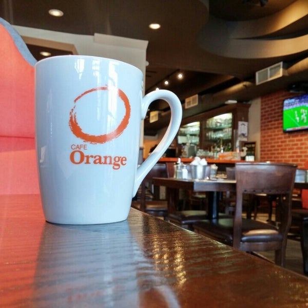 Photo taken at Orange Café by Andreas S. on 4/9/2015