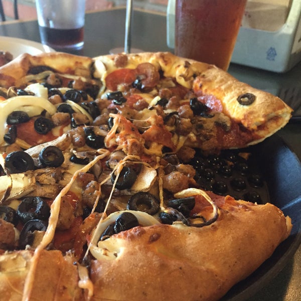 Photo taken at Woodstock&#39;s Pizza by MJ L. on 7/22/2015