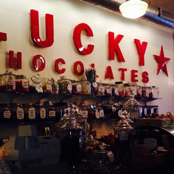 Photo taken at Lucky Chocolates, Artisan Sweets And Espresso by Colleen M. on 12/27/2013