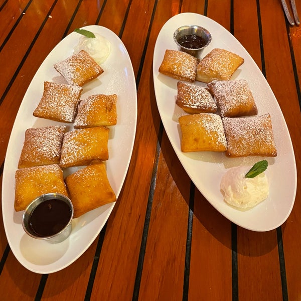 it's cheaper to just keep adding extra beignets to a single order than to get multiple orders.