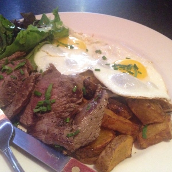 breakfast steak and eggs with vinaigrette green salad and roast potato