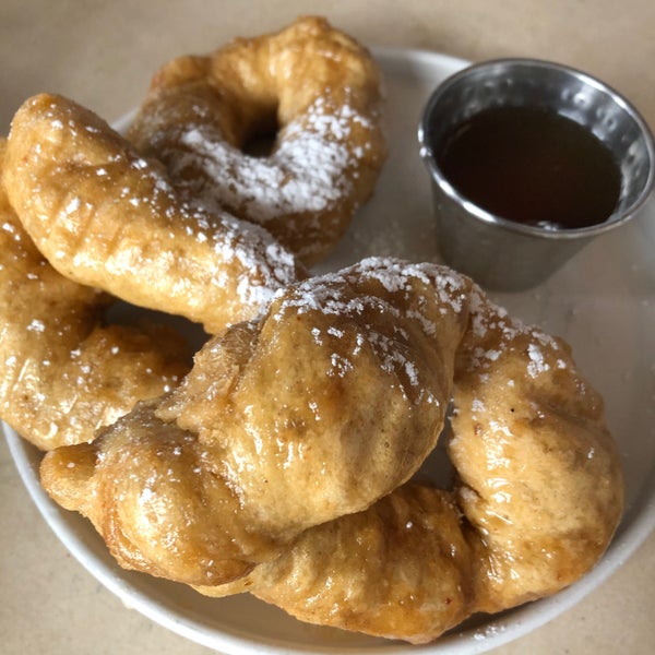 moroccan donuts with floral syrup and powdered sugar