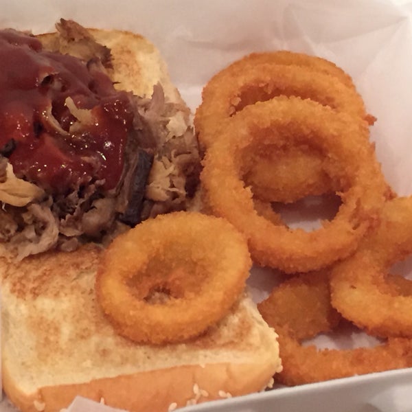 prospect park bbq pulled pork sandwich with onion rings