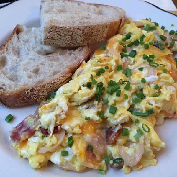 three egg scramble with bacon, cheddar, and scallion