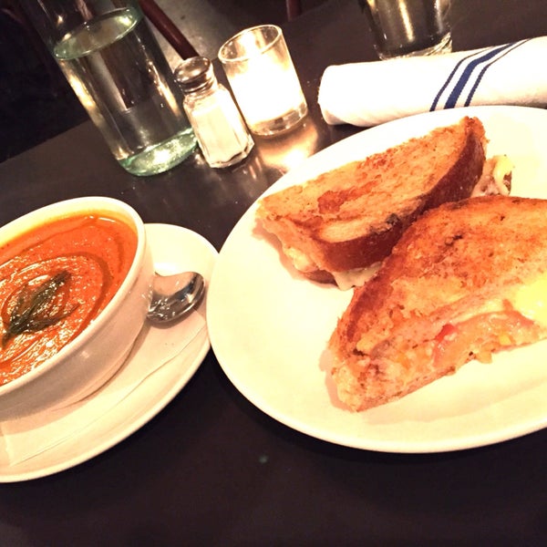 grilled cheese sandwich with bowl of creamy tomato fennel soup
