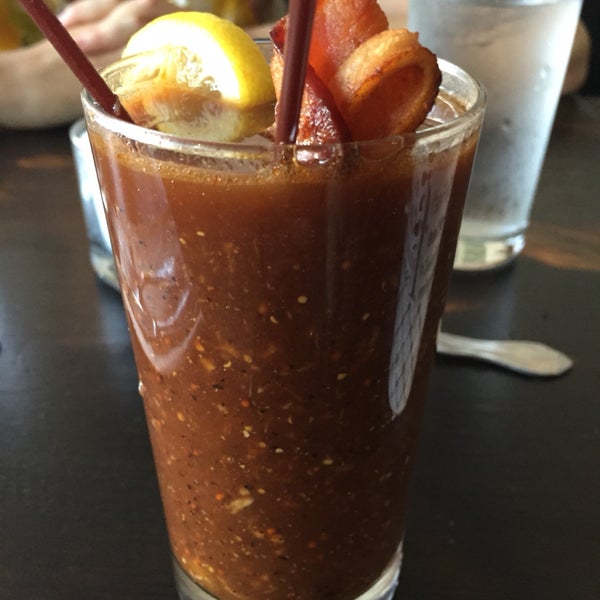 bloody breakfast - bloody mary with a splash of dark beer and bacon garnish