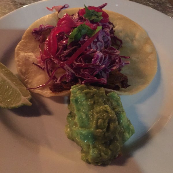 taco tuesday pulled pork taco with guacamole