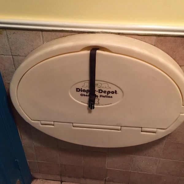 baby changing table in the bathroom in the back