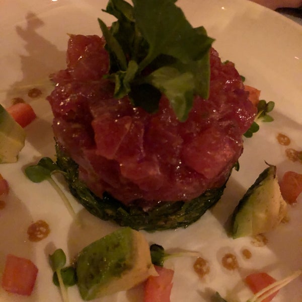 tuna tartare on seaweed salad with avocado and ginger soy