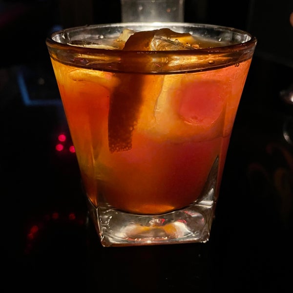 The Mistress: high proof bourbon with marshmallow root, vanilla, brown sugar, and notes of dark rum, over ice