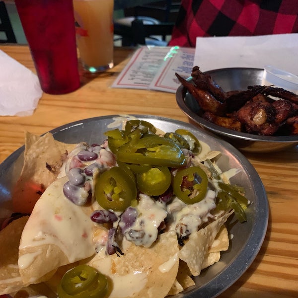 Photo taken at Ugly Dog Saloon and BBQ by Marcie L. on 1/1/2019