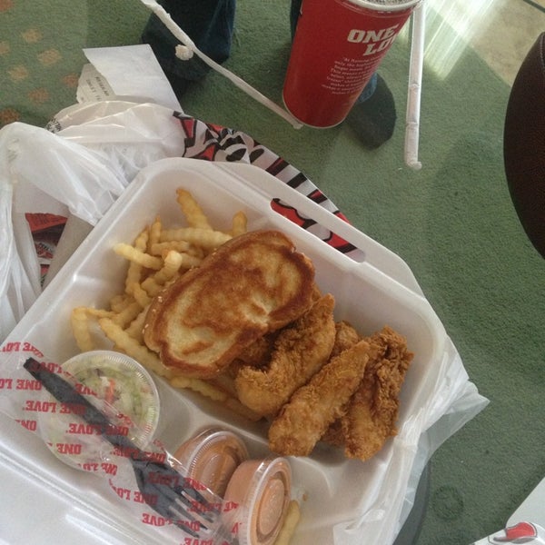 Photo taken at Raising Cane&#39;s Chicken Fingers by Neal B. on 12/29/2013